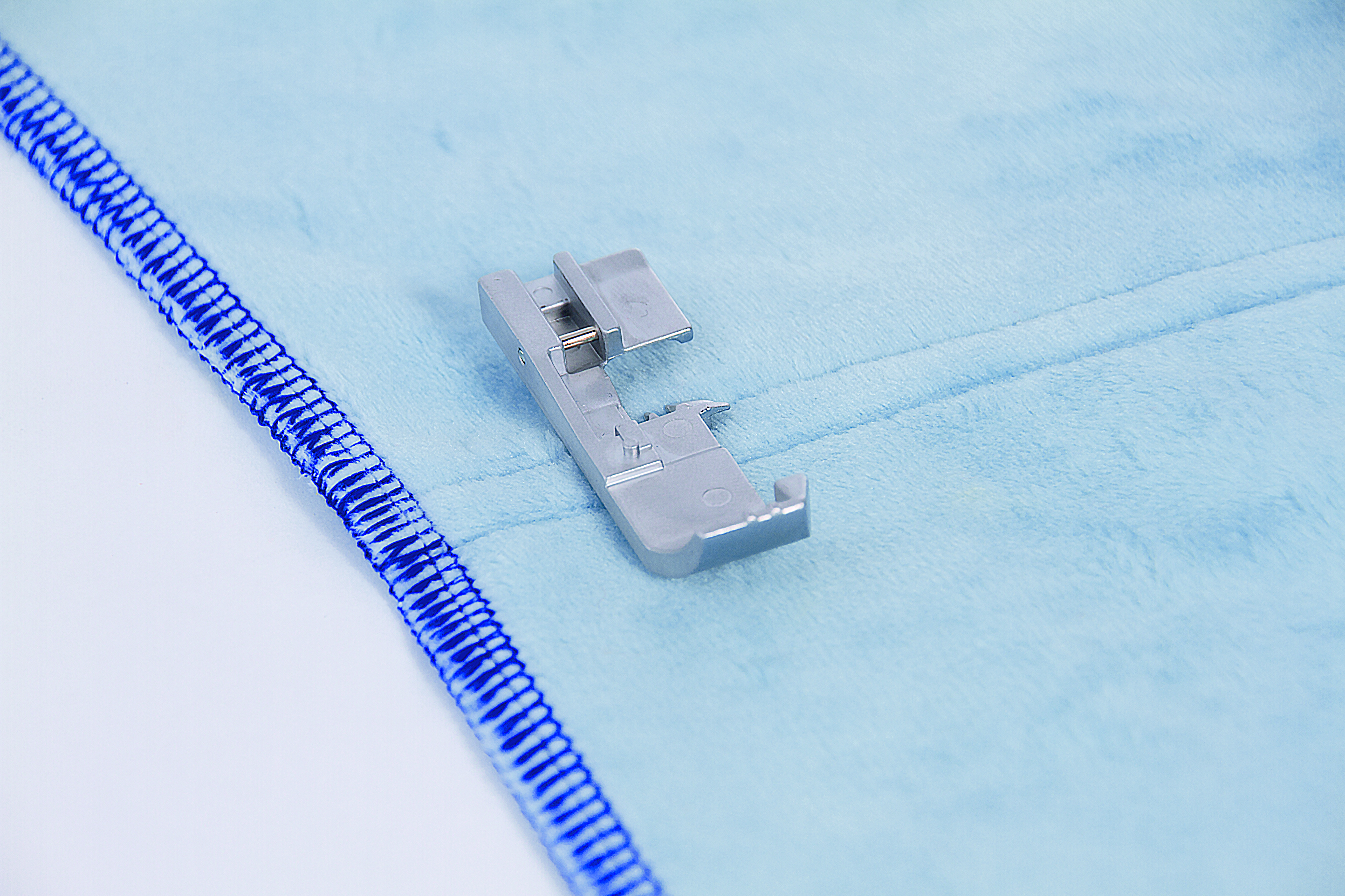 Flachsohlenfuß baby lock Overlockmaschinen